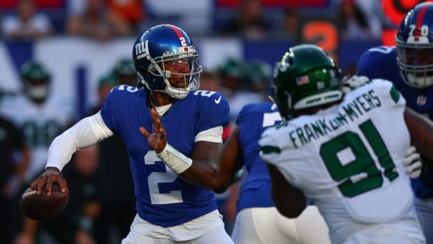 Aug 26, 2023; East Rutherford, New Jersey, USA; New York Giants quarterback Tyrod Taylor (2) runs with the ball against the New York Jets during the first half at MetLife Stadium.
